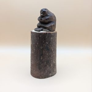 Beaver in a log